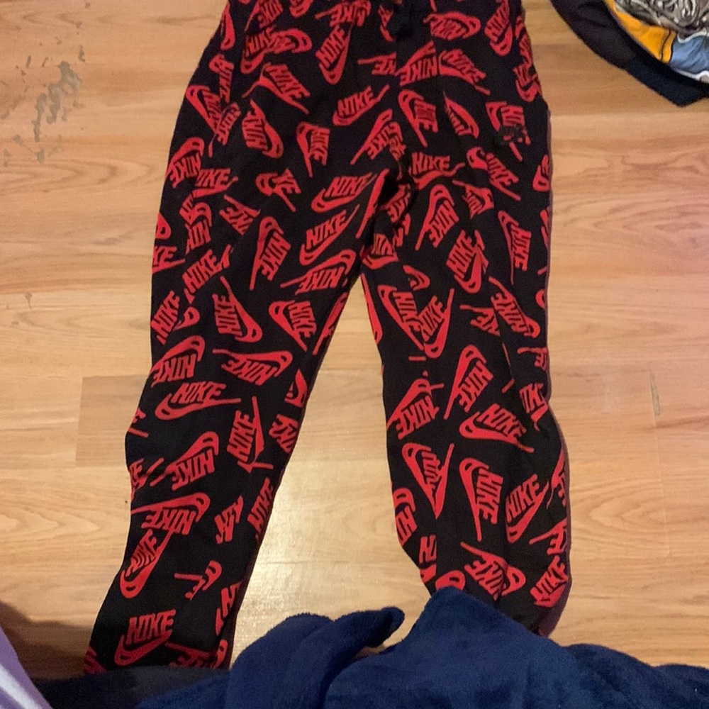 Nike red and black sweat pants
